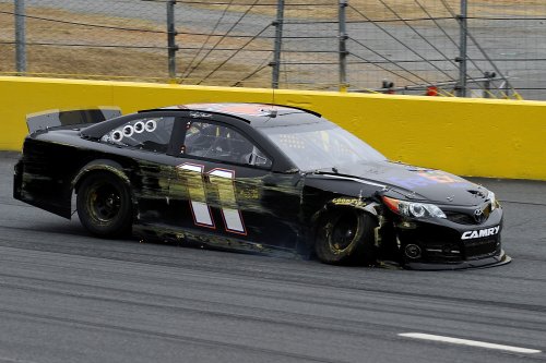 Denny Hamlin drives the #11 FedEx Toyota after an incident during testing at Charlotte Motor Speedway Wednesday.  Photo by Jared C. Tilton/Getty Images for NASCAR