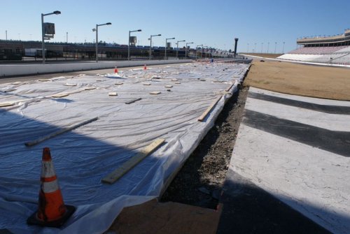 Work is underway at Atlanta Motor Speedway to convert part of pit road into a 250-foot NHRA-quality concrete launch pad at Friday Night Drags & Show-N-Shine. The pad will extend from the burnout box through the starting line and nearly 100 feet down the eighth-mile pit lane drag strip.  Photo courtesy Atlanta Motor Speedway