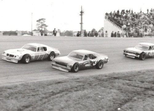 Luther Carter (3) does battle with Darrell Waltrip (17) and Jack Bland (41) at Five Flags Speedway.  Photo courtesy GRHOF