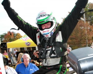 John Force, seen here from an earlier victory, scored Funny Car Win number three on the year Sunday at Pacific Raceways.  Photo by Rhonda McCole