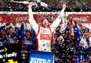 Dale Earnhardt, Jr. celebrates in victory lane after winning February's Daytona 500.  He hopes to sweep this year's Daytona Sprint Cup races with a win in the Coke Zero 400 Saturday night.  Photo by Tom Pennington/Getty Images