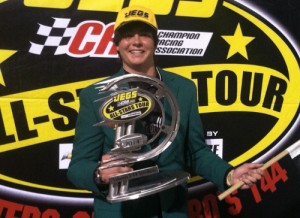 Anderson Bowen sports the unique Masters Green Jacket in victory lane after scoring the JEGS/CRA All-Stars victory Saturday night at I-44 Speedway. Photo courtesy CRA Media