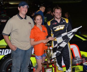 D.J. Shaw celebrates in victory lane after winning the PASS North feature Saturday night at Star Speedway.  Photo by Norm Marx