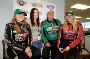 Brittany Force, Laurie Force, John Force and Courtney Force are all smiles after Brittany and Courtney led Saturday's NHRA qualifying at Topeka in their respective classes.  Photo courtesy NHRA Media