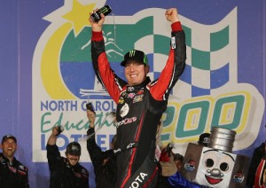 Kyle Busch celebrates in victory lane after winning Friday night's NASCAR Camping World Truck Series race at Charlotte Motor Speedway. Photo by Jerry Markland/Getty Images