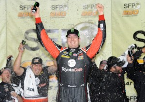 Kyle Busch celebrates in victory lane after winning Friday night's NASCAR Camping World Truck Series race at Kansas Speedway. Photo by Jared C. Tilton/NASCAR via Getty Images