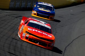 Kyle Larson (42) leads Chase Elliott (9) en route to winning Saturday's NASCAR Nationwide Series race at Charlotte Motor Speedway. Photo by Matt Sullivan/Getty Images