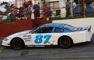 Mike Looney races under the checkered flag to score the Late Model Stock victory Monday evening at Franklin County Speedway.  Photo courtesy Moonshine Capital Promotions