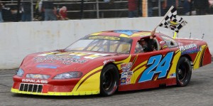 Mike Rowe takes a victory lap after scoring the victory in Saturday's PASS North Super Late Model feature at Beech Ridge Motor Speedway.  Photo by Norm Marx