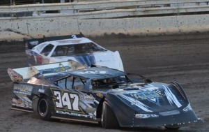 Defending NeSmith Chevrolet Weekly Racing Series National Champion Noah Daspit of Kiln, MS (347) battles in the high groove with Chris Holley of Dayton, TX (17) on Saturday night at Battleground Speedway in Highlands, TX.  Daspit won the race and collected a $200 Bounty, along with the $1,000 top prize, to end Holley’s unbeaten streak at six wins.  Photo by jonrheilphotography.com