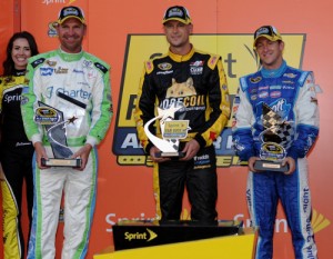 Clint Bowyer (left), Josh Wise (center) and A.J. Allmendinger (right) celebrate in victory lane after Friday night's NASCAR Sprint Cup Series Sprint Showdown at Charlotte Motor Speedway.  Bowyer's win and Allmendinger's second place finish will transfer them into Saturday night's Sprint All Star race, while Wise will get in after receiving the most votes from the online fan vote. Photo by Jonathan Moore/Getty Images