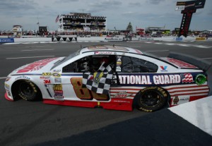 Dale Earnhardt, Jr. celebrates with the checkered flag after winning last week's Pocono 400 at Pocono Raceway.  Photo by NASCAR Via Getty Images