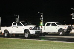 Dwayne Bethune (far lane) faced off against his wife Ramae Bethune (near lane) in the Diesel Truck division final at last week's Friday Night Drags at Atlanta Motor Speedway.  Dwayne took the win, and the two are now tied for first in division points.  Photo by Tom Francisco/Speedpics.net