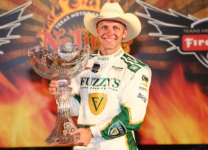 Ed Carpenter celebrates in victory lane after winning Saturday night's IndyCar Firestone 600 at Texas Motor Speedway.  Photo by Chris Jones