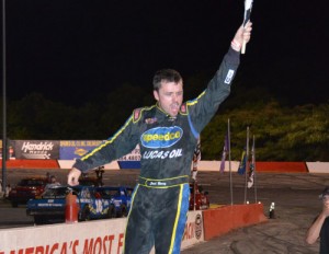 Josh Berry celebrates after scoring the Late Model victory Saturday night at Hickory Motor Speedway.  Photo by Sherri Stearns