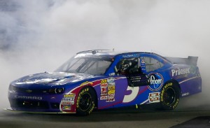 Kevin Harvick celebrates with a burn out after scoring the NASCAR Nationwide Series victory Friday night at Kentucky Speedway.  Photo by Matt Sullivan/NASCAR via Getty Images