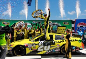 Matt Kenseth celebrates in victory lane after winning the 2013 NASCAR Sprint Cup Series rac at Kentucky Speedway.  Photo by Chris Trotman/Getty Images