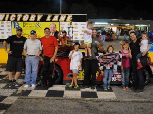 R.A Brown celebrates with his team and family after scoring the Late Model Stock win Friday night at Anderson Motor Speedway.  Photo by Christy Kelley