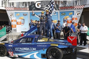 Richard Westbrook and Michael Valiante celebrate in victory lane after winning Sunday afternoon at Watkins Glen.  Photo by Michael L. Levitt LAT Photo USA for IMSA