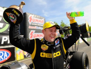 Richie Crampton is all smiles after scoring his first career Top Fuel finals victory Sunday at Old Bridge Township Raceway Park.  Photo courtesy NHRA Media