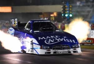 Tommy Johnson, Jr. powers away from the line during Saturday's Funny Car qualifying at Route 66 Raceway in Joliet, IL.  Photo courtesy NHRA Media