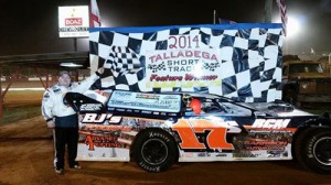 Jeff Smith of Chatsworth, GA celebrates a dominate win after leading all 40 laps of the NeSmith Chevrolet Dirt Late Model Series race at Talladega Short Track Thursday night.  Photo courtesy Talladega Short Track