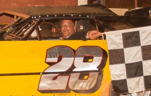 Paul Holloway celebrates in Senoia Raceway's victory lane after scoring his first B Cadet win of 2014 Saturday night.  Photo by Francis Hauke/22fstops.com