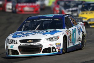 A.J. Allmendinger held off a hard charge from Marcos Ambrose to score his first career NASCAR Sprint Cup Series victory Sunday at Watkins Glen International.  Photo by Chris Graythen/NASCAR via Getty Images