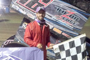 Anthony Nicholson held off Tim Crawley on a green-white-checkered finish to score the USCS Sprint Car victory at Greenville Speedway Friday night.  Photo by Jacob Seelman