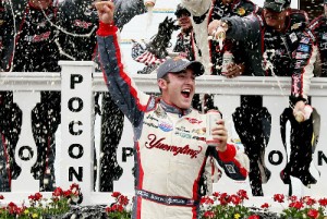 Austin Dillon celebrates in Victory Lane after winning Saturday's NASCAR Camping World Truck Series race at Pocono Raceway.  Photo by Sarah Glenn/Getty Images