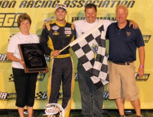 Travis Braden celebrates in victory lane after winning Saturday night's Bud St. Amant Memorial 174 at Columbus Motor Speedway.  Photo courtesy CRA Media