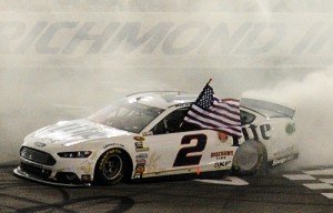 Brad Keselowski celebrates with a burnout after winning Saturday night's NASCAR Sprint Cup Series race at Richmond International Raceway.  Photo by Rainier Ehrhardt/Getty Images