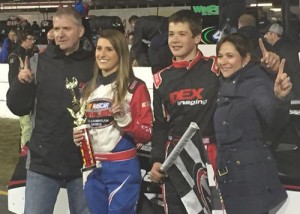 Harrison Burton celebrates in victory lane his father Jeff Burton (left) and mother Kim (right) after winning his first Super Late Model feature at New Smyrna Speedway Friday night.  Photo by Brooke Franceschini/NASCAR