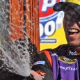 With Brad Keselowski beating a tattoo into his rear bumper, and with his No. 11 Joe Gibbs Racing Toyota sliding sideways as it approached the checkered flag, Denny Hamlin held […]