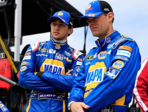 Chase Elliott (left) speaks with his crew chief Kenny Francis before the start of Sunday's NASCAR Sprint Cup Series Trace at Richmond International Raceway.  Photo by Alex Trautwig/Getty Images