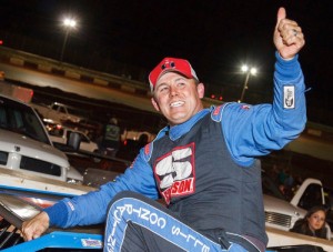 Derek Ellis gives a thumbs-up to the crowd after scoring the Super Late Model season opener at Rome Speedway Sunday night.  Photo by Kevin Prater/praterphoto.com