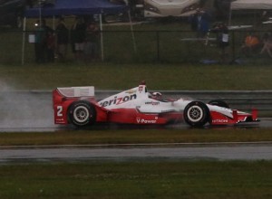 Juan Pablo Montoya kicks up a rooster tail as he heads towards turn 10 at NOLA Motorsports Park.  The rains washed out qualifying, giving Montoya the pole based on points for the inaugural Indy Grand Prix of Louisiana.  Photo by Chris Jones