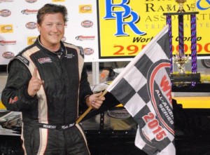 Kyle Plott celebrates in victory lane after scoring his first Late Model Stock feature at Anderson Motor Speedway Friday night.  Photo by Christy Kelley