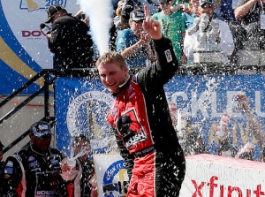 Chris Buescher celebrates after winning Saturday's NASCAR Xfinity Series race at Dover International Speedway.  Photo by Todd Warshaw/Getty Images