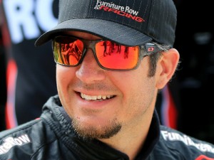 Martin Truex, Jr. looks on from the grid during qualifying for Sunday's NASCAR Sprint Cup Series race at Dover International Speedway.  Photo by Daniel Shirey/NASCAR via Getty Images