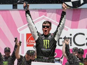 Erik Jones celebrates in victory lane after winning Sunday's NASCAR Xfinity Series race at Chicagoland Speedway.  Photo by Kena Krutsinger/NASCAR via Getty Images