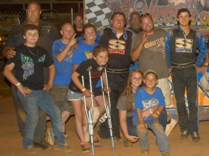 Joe Armistead, Jr. (center) celebrates with his team after winning Saturday night's Super Late Model feature at Senoia Raceway.  Photo by Francis Hauke/22fstops.com