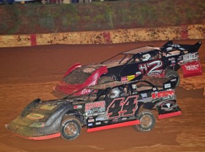 John Ownbey (44) drives to the inside of Matt Henderson (#H2) to take the lead on lap 32 of the 2nd Annual Bill Hendren Memorial 40 on Friday night at Tri-County Race Track.  Photo courtesy NeSmith Media