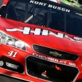 Starting 24th in a backup car, Kurt Busch fought his way to the front of the field through intermittent rain showers and won Sunday’s Quicken Loans 400 at Michigan International […]