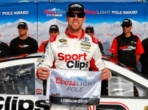 Carl Edwards poses with the Coors Light Pole Award after qualifying for pole position for Sunday's NASCAR Sprint Cup Series race at New Hampshire Motor Speedway.  Photo by Jonathan Ferrey/NASCAR via Getty Images