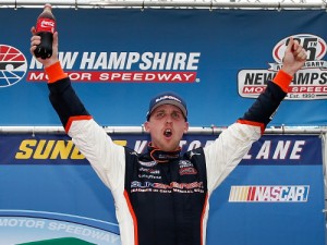 Denny Hamlin celebrates in victory lane after scoring the victory in Saturday's NASCAR Xfinity Series race at New Hampshire Motor Speedway.  Photo by Todd Warshaw/NASCAR via Getty Images