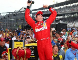 Kyle Busch celebrates in victory lane after winning Sunday's NASCAR Sprint Cup Series race at Indianapolis Motor Speedway.  Photo by Matt Sullivan/Getty Images