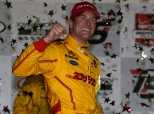 Ryan Hunter-Reay celebrates in victory lane after winning Saturday night's Iowa Corn 300 at Iowa Speedway.  Photo by Chris Jones