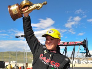 Steve Torrence celebrates his victory in Sunday's Top Fuel final at the Mopar Mile-High NHRA Nationals at Bandimere Speedway.  Photo courtesy NHRA Media