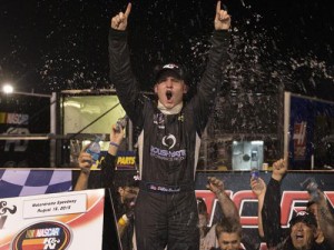 Dillon Bassett and team celebrate in following his first career NASCAR K&N Pro Series East win Saturday night at Motordrome Speedway. Photo by Mitchell Leff/Getty Images for NASCAR